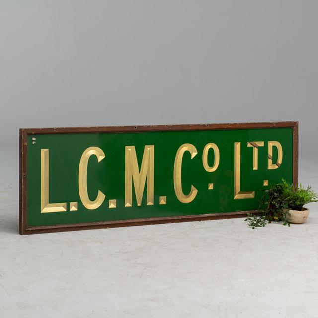 Incised Glazed Company Sign