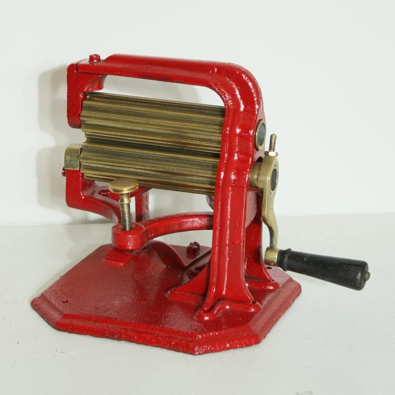 Antique red fluting iron Image 1