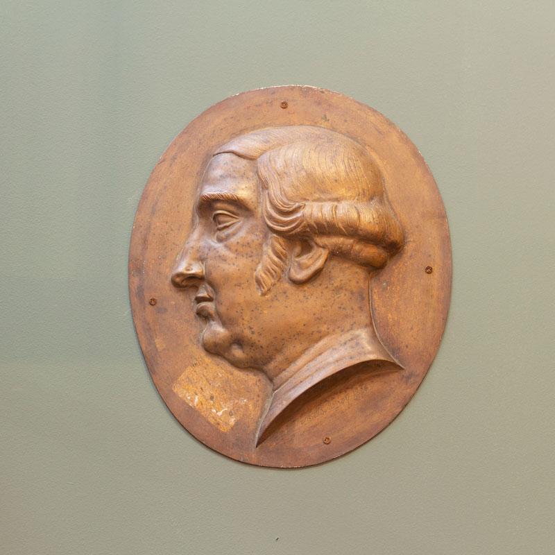 Brass bas-relief plaque