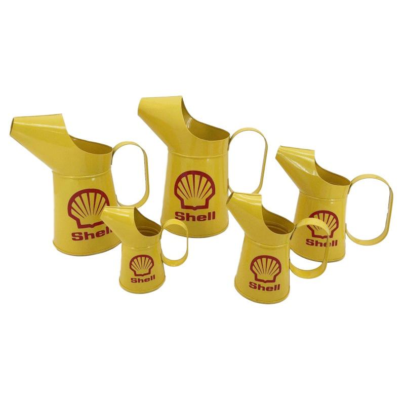Set of five Shell oil jugs Image 1